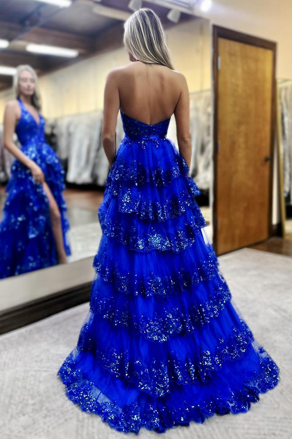 Royal Blue Glitter Halter Prom Dress Featuring a Bow and Long Ruffles