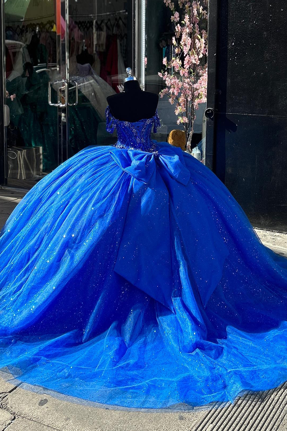 Royal Blue Sparkle Off-Shoulder Quinceanera Dress with Sequined Appliques and Tulle Bow