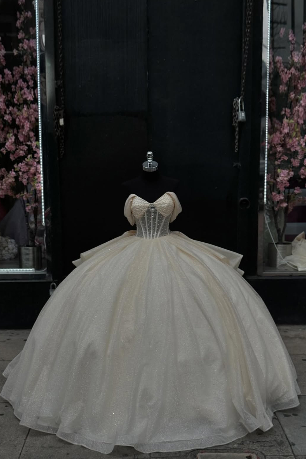 Off-the-Shoulder Apricot Ball Gown with Sparkly Tulle Ruffles and Bow for Quinceanera