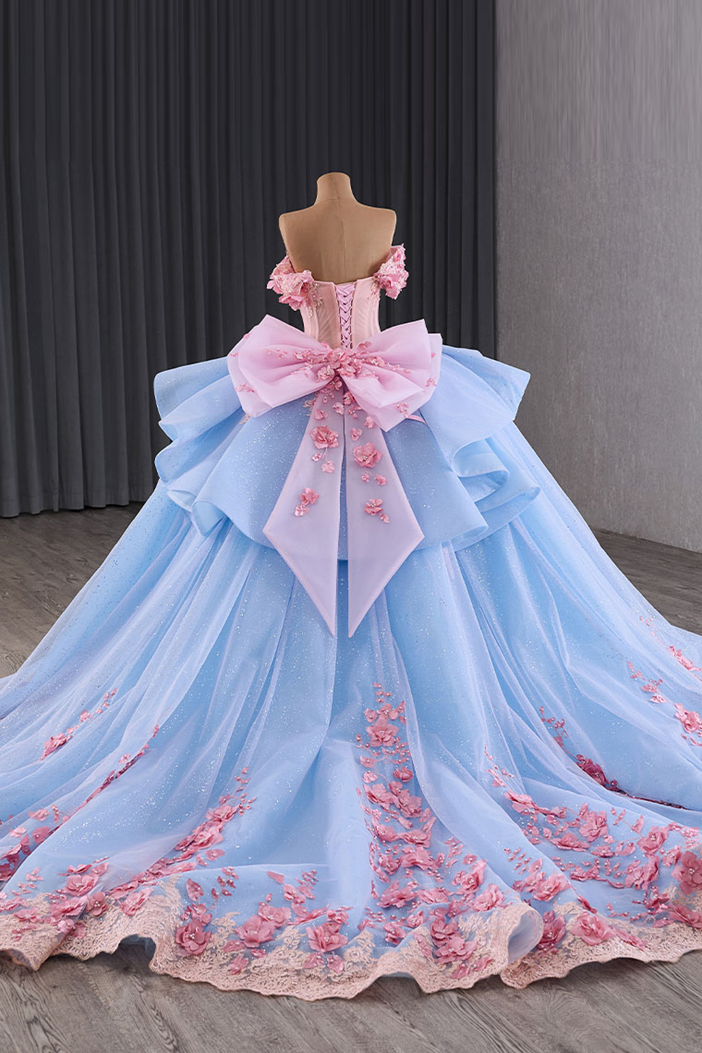 Princess Quinceanera Dress in Blue with Off-Shoulder Design, Beaded Applique, and Pink Bow
