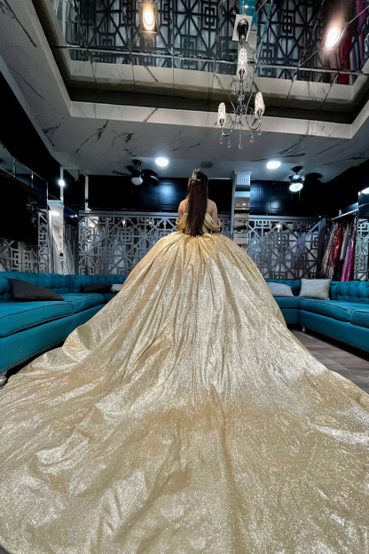 Golden Off-the-Shoulder Quinceanera Ball Gown with Sparkly Train