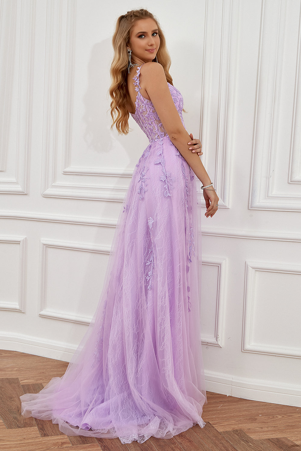 Prom dress in navy featuring off-the-shoulder design and appliques