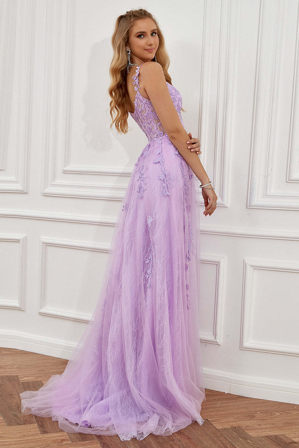 Prom dress in navy featuring off-the-shoulder design and appliques