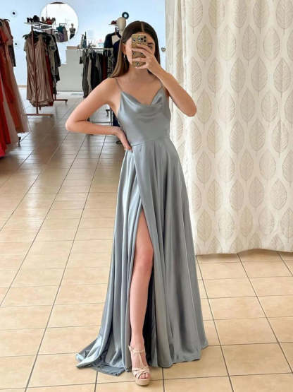 Light green long A-line prom dress with spaghetti straps and slit