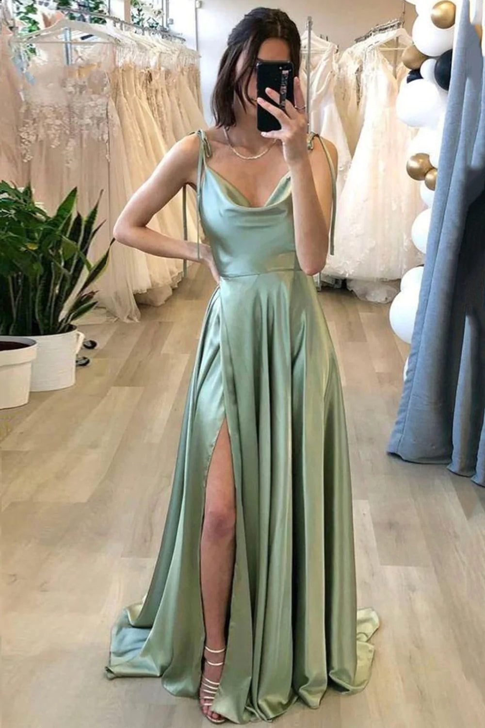Light green long A-line prom dress with spaghetti straps and slit