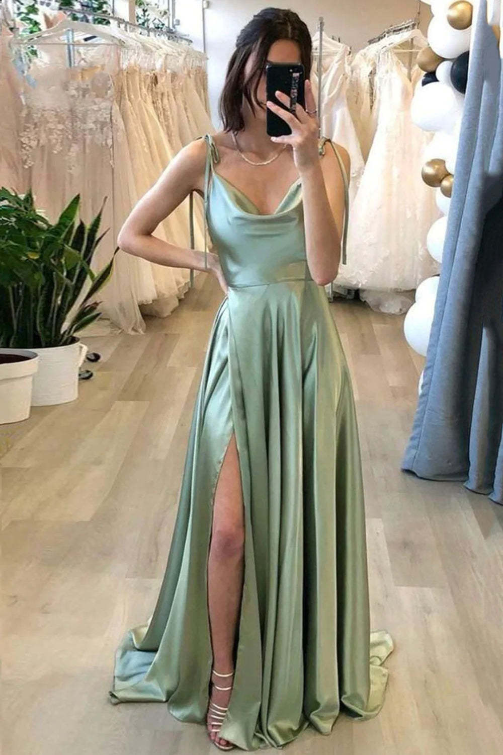 Light green long A-line prom dress with spaghetti straps and slit