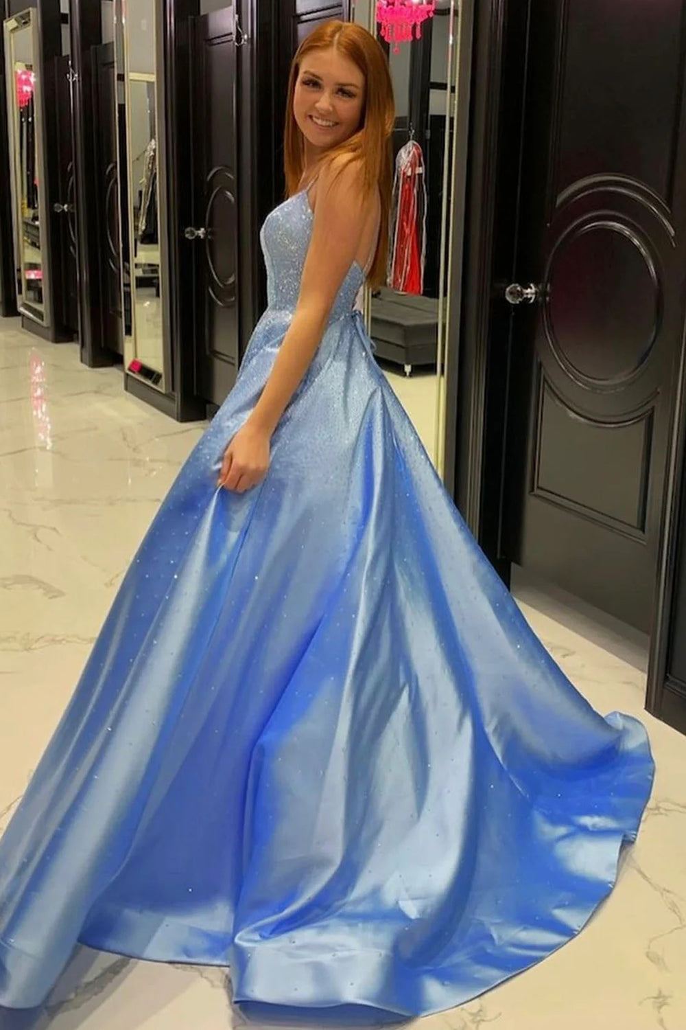 Long Blue Prom Dress with Spaghetti Straps and Criss Cross Back in A-Line Silhouette
