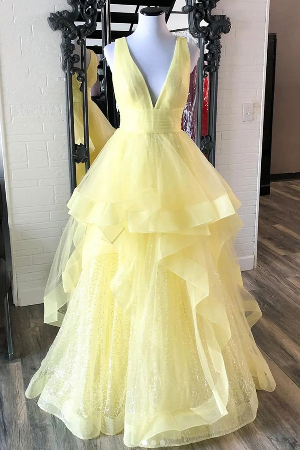 Light Yellow Long Prom Dress with Ruffles and a Deep V Neckline