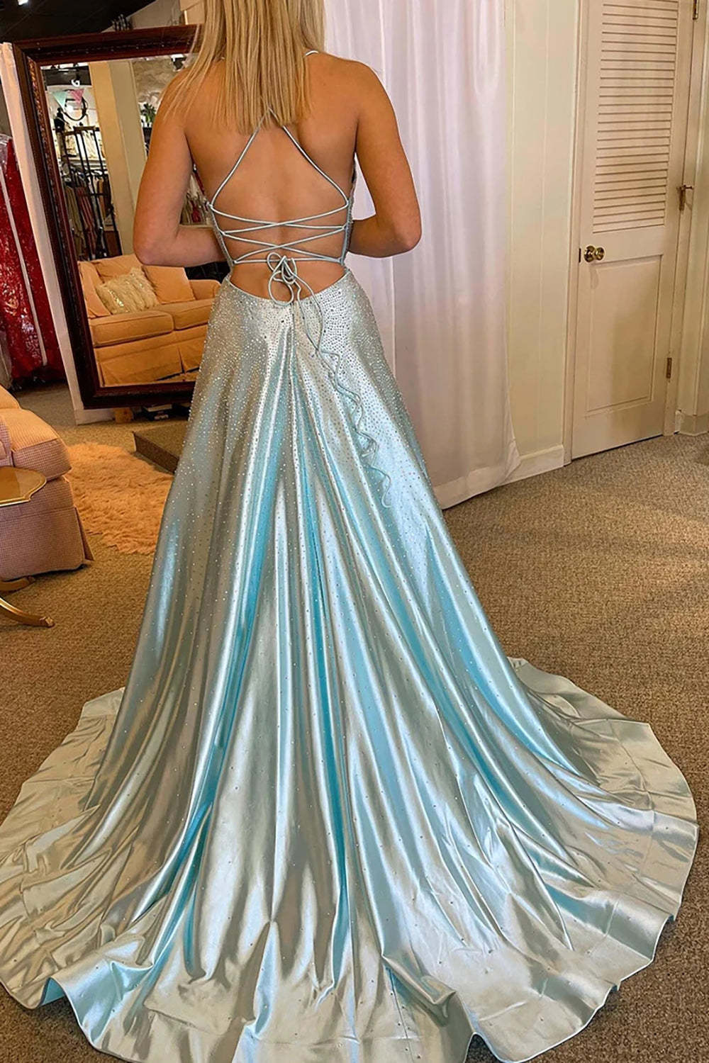 Long V-Neck Prom Dress in Light Blue Featuring a Criss Cross Back