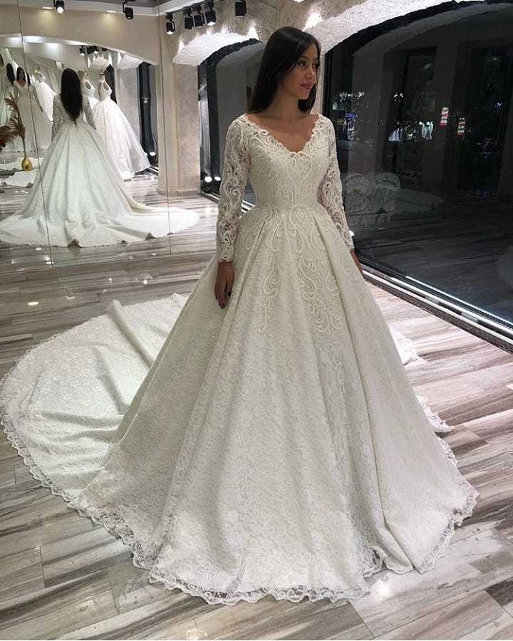 Classic A-Line Long Sleeves Floor-Length Deep V-Neck Wedding Dress with Appliques Lace