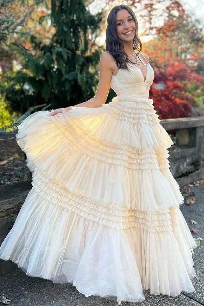 Long White Prom Dress with Tiered Tulle and Spaghetti Straps Featuring a Slit