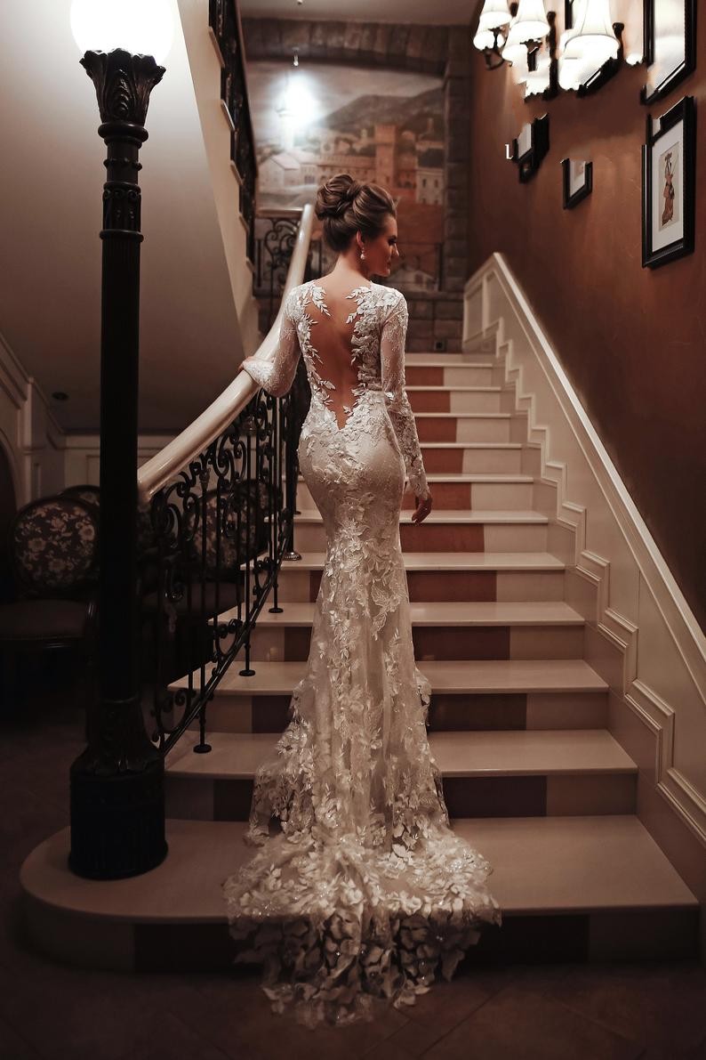 Charming White High Neck Backless Mermaid Long Sleeve Wedding Dress with Appliques Lace