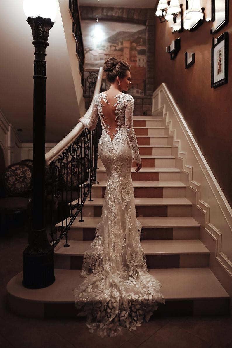 Charming White High Neck Backless Mermaid Long Sleeve Wedding Dress with Appliques Lace