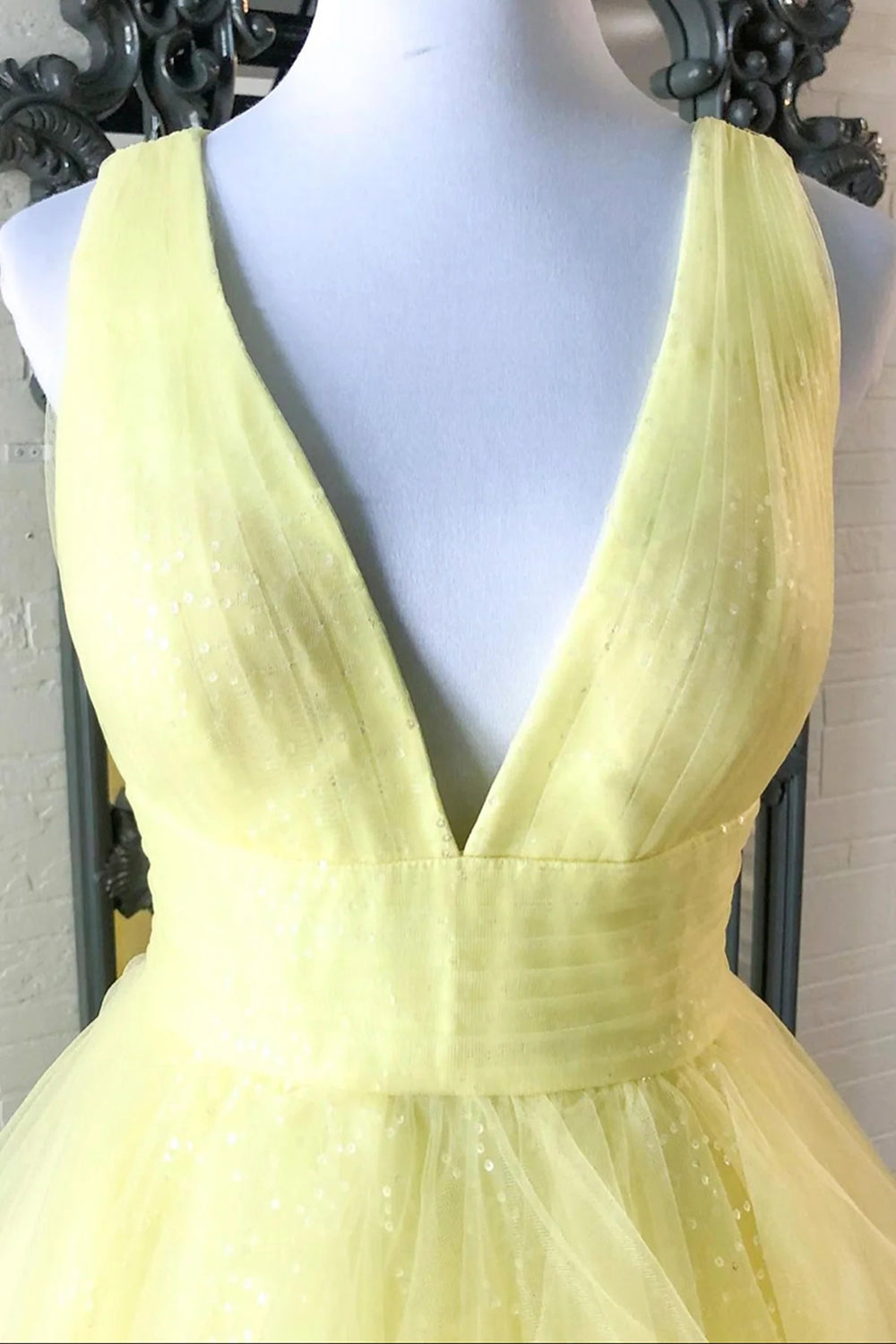 Light Yellow Long Prom Dress with Ruffles and a Deep V Neckline
