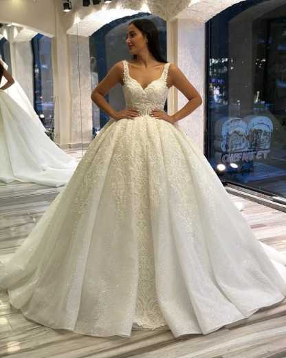 Stunning Spaghetti-Straps Sequins Backless Ball Gown Sweetheart Wedding Dress with Appliques Lace