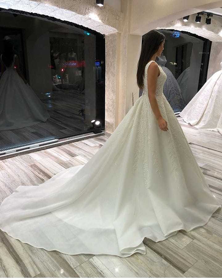 Stunning Sleeveless V-Neck Long A-Line Wedding Dress with Lace
