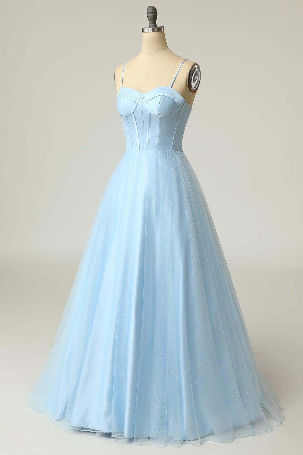Light purple long prom dress with spaghetti straps in an A-line cut