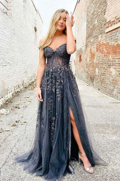 Prom dress in navy featuring off-the-shoulder design and appliques