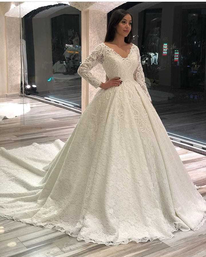 Classic A-Line Long Sleeves Floor-Length Deep V-Neck Wedding Dress with Appliques Lace