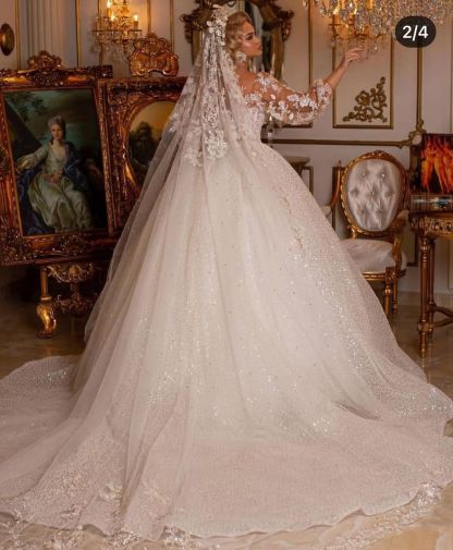 Stunning Ball Gown Puffy Sleeves Long Wedding Dress with Appliques