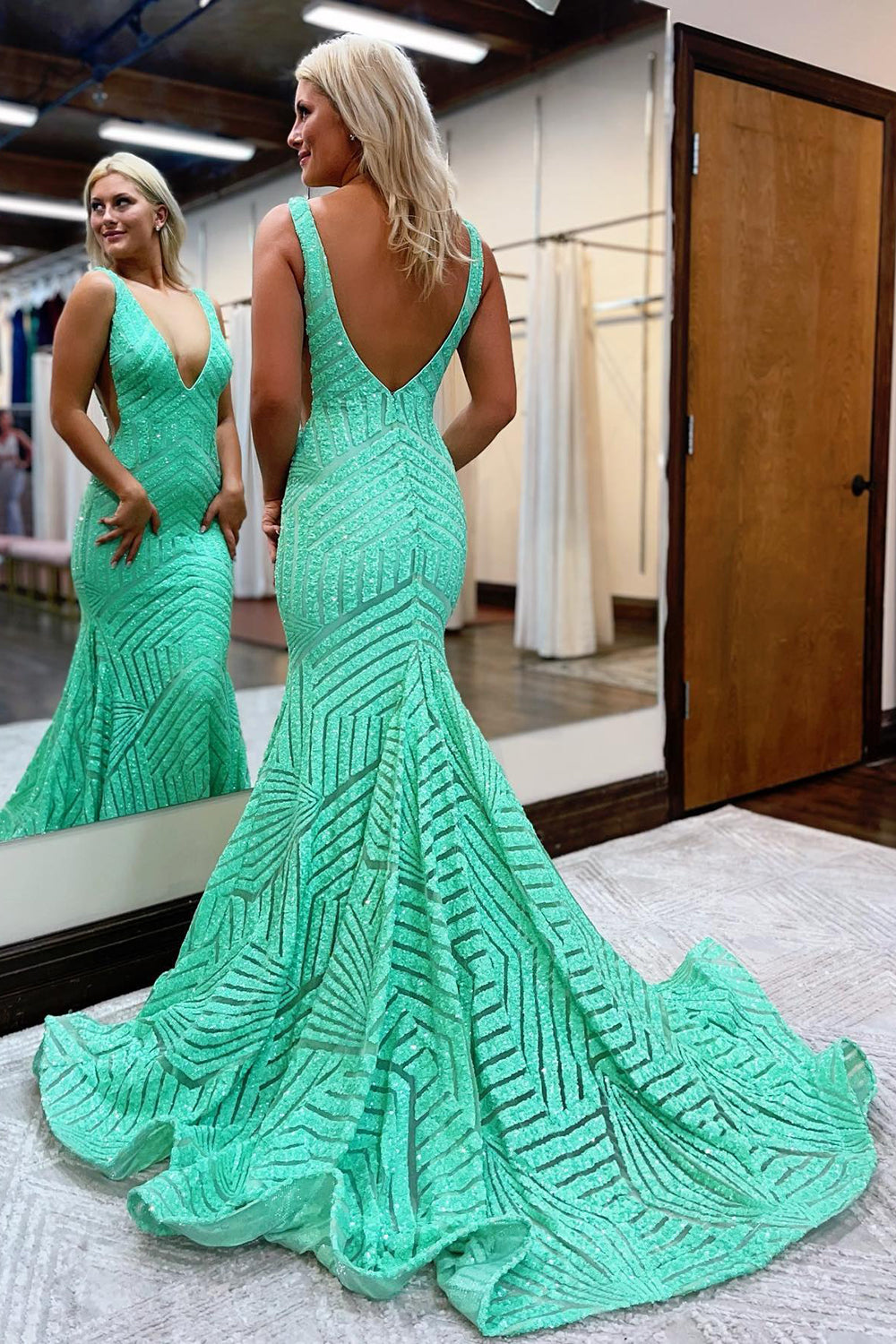 Long Prom Dress with Sparkly Blue Mermaid Cut and Red Sequins in Deep V Neck
