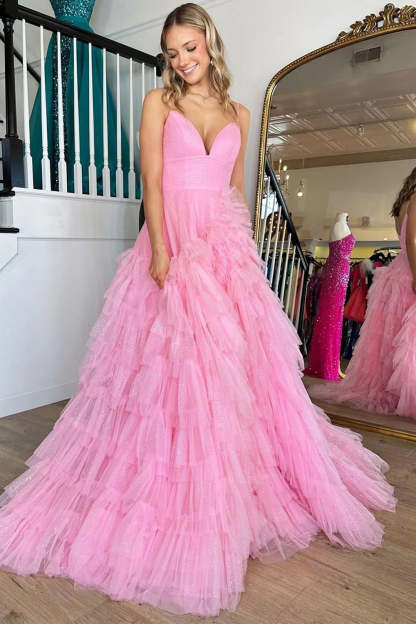 Pink long prom dress with spaghetti straps and ruffles in A-line style