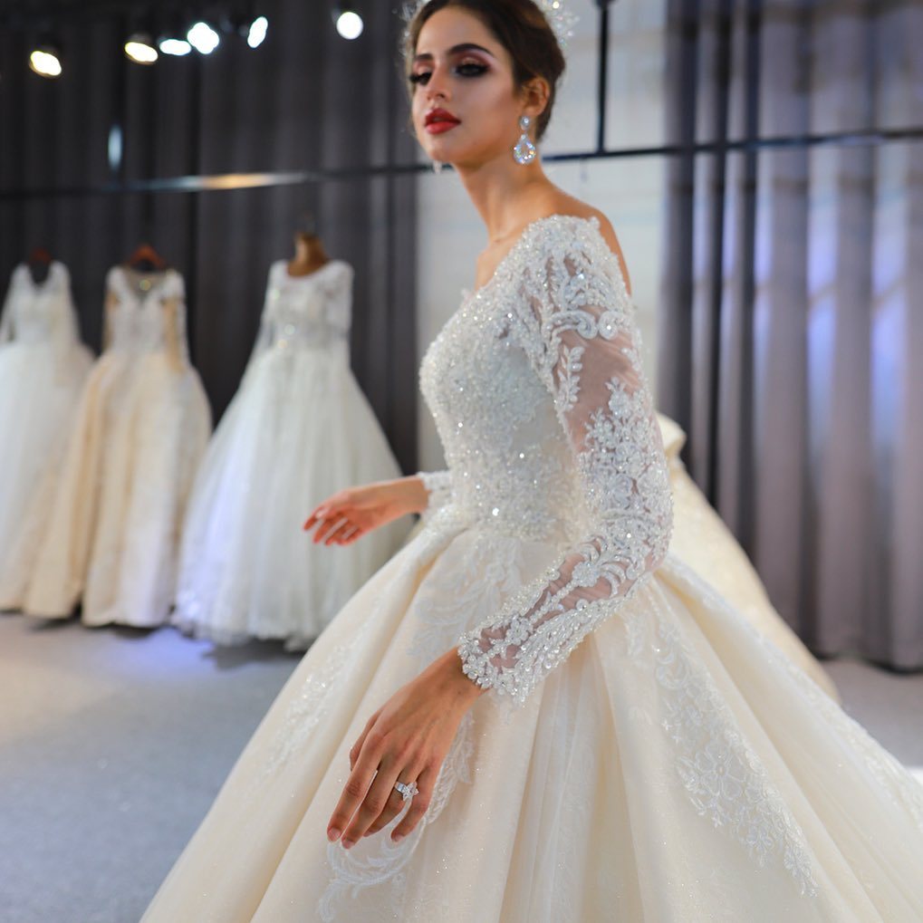 Stylish Train Sweetheart Backless Long Sleeves A-Line Wedding Dress with Appliques Lace Sequins