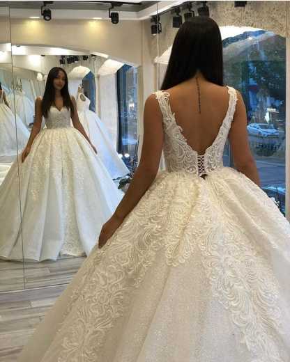 Stunning Spaghetti-Straps Sequins Backless Ball Gown Sweetheart Wedding Dress with Appliques Lace