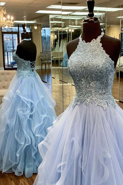 Long Blue A-Line Prom Dress Featuring Halter Neck and Open Back with Appliques