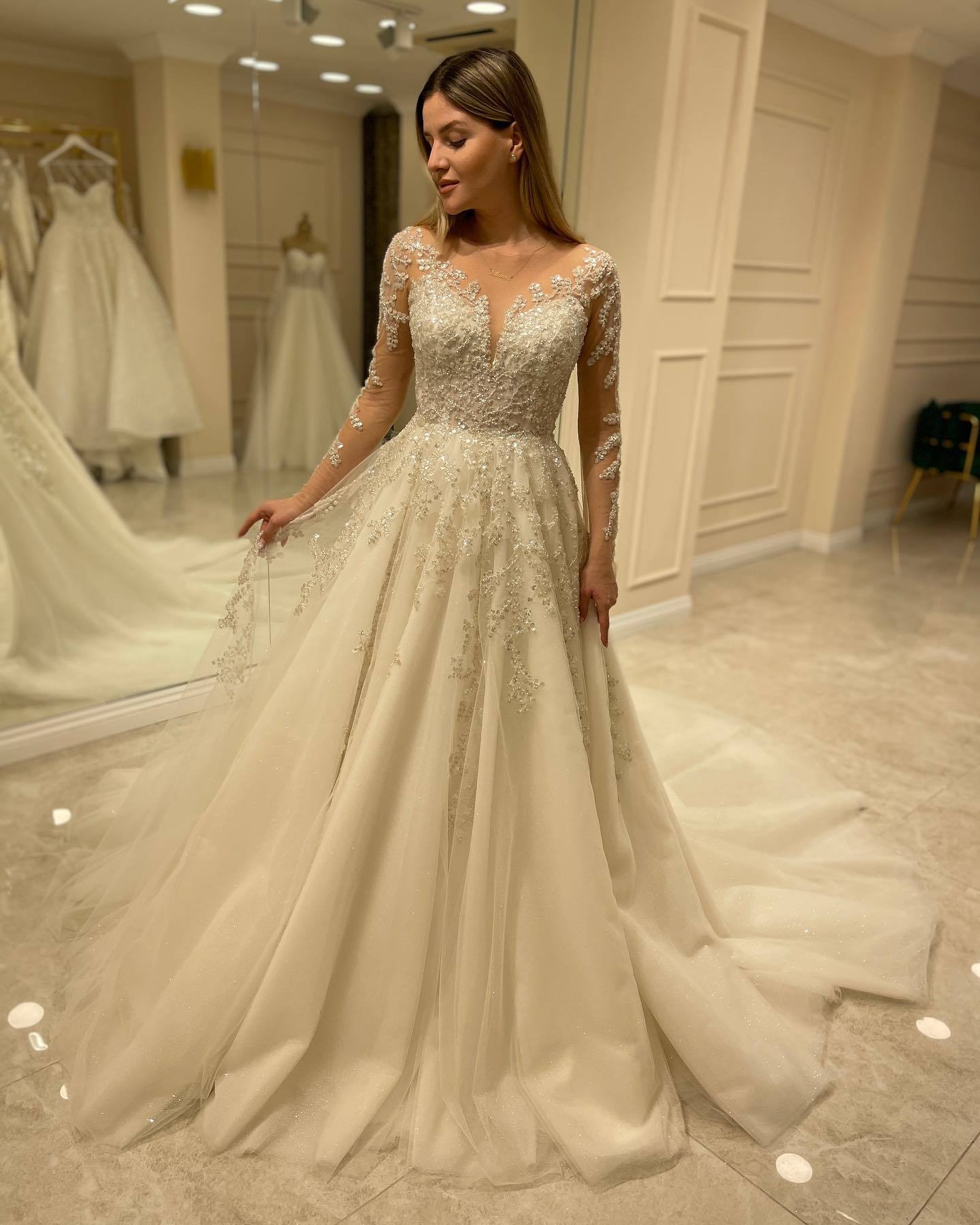 Charming A-Line Lace Appliques Long Wedding Dress with Sleeves