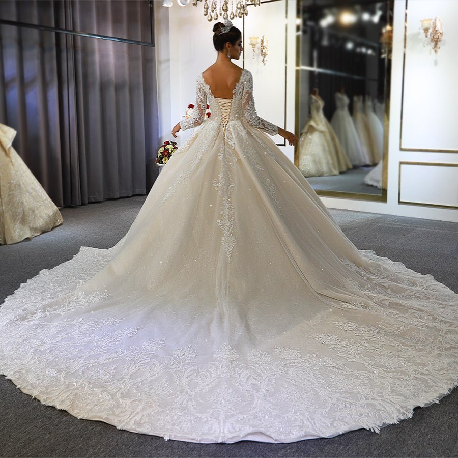 Stylish Train Sweetheart Backless Long Sleeves A-Line Wedding Dress with Appliques Lace Sequins