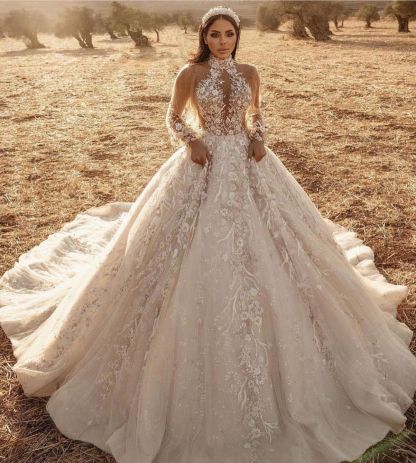 Stunning A-Line High-Neck Long Sleeve Train Wedding Dress with Appliques Lace Tulle