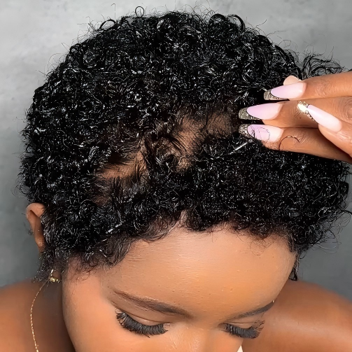 Natural black short curly pixie lace front wig by Onimehair, full lace free part human hair wig for women showing the textured curls.