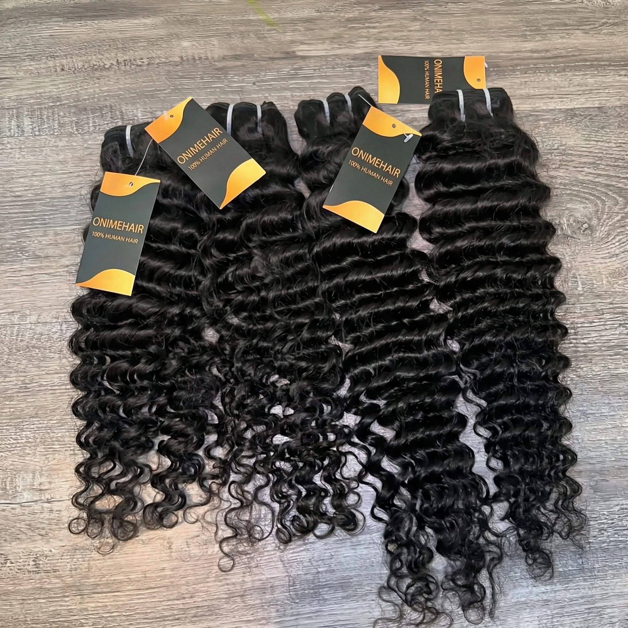 10A Grade Deep Curly Wave Bundles of 100% Human Virgin Hair Extensions in rich, bouncy curls.