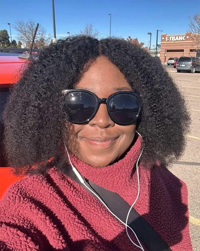 HD transparent Coily Shake N Go full wig by mysite with natural coily curls and no bangs, showcasing realistic hair texture.
