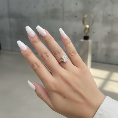 Rose Gold Three-Stone Emerald Cut Engagement Ring