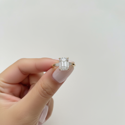 Stunning Gold Three-Stone Emerald Cut Engagement Ring