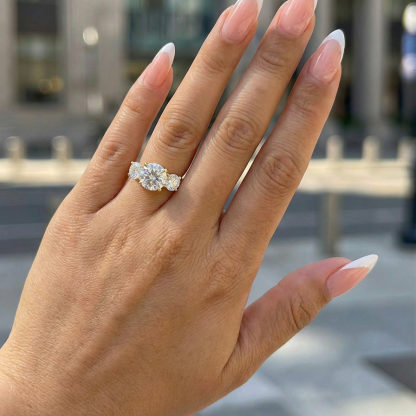 beautiful round cut trio engagement ring