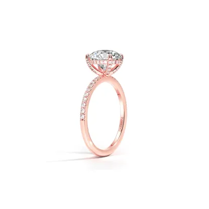 rose gold oval cut engagement ring