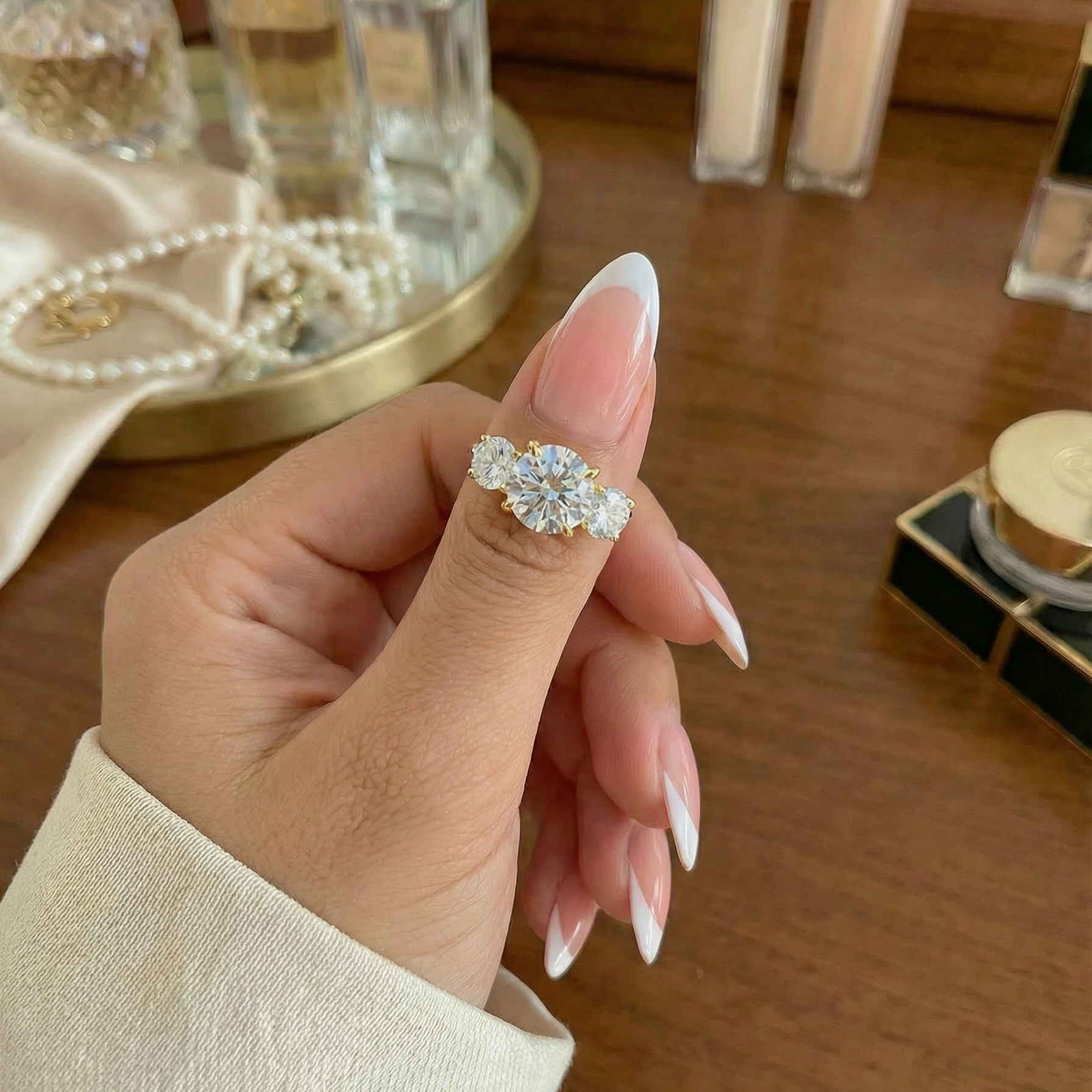 stunning three stone gold round cut engagement ring trinity