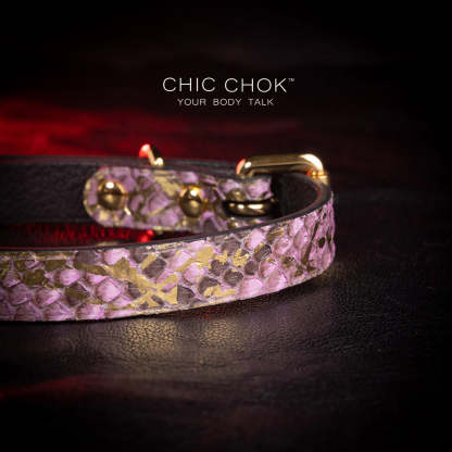 chicchok butterfly choker featuring a textured,  intricate butterfly pendant adorned with gold accents and shimmering gemstones for an elegant and luxurious look.