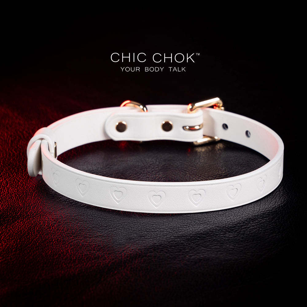 chicchok choker Chic white leather choker with embossed heart patterns and gold metal accents, featuring an adjustable design that blends purity and sophistication for all occasions.