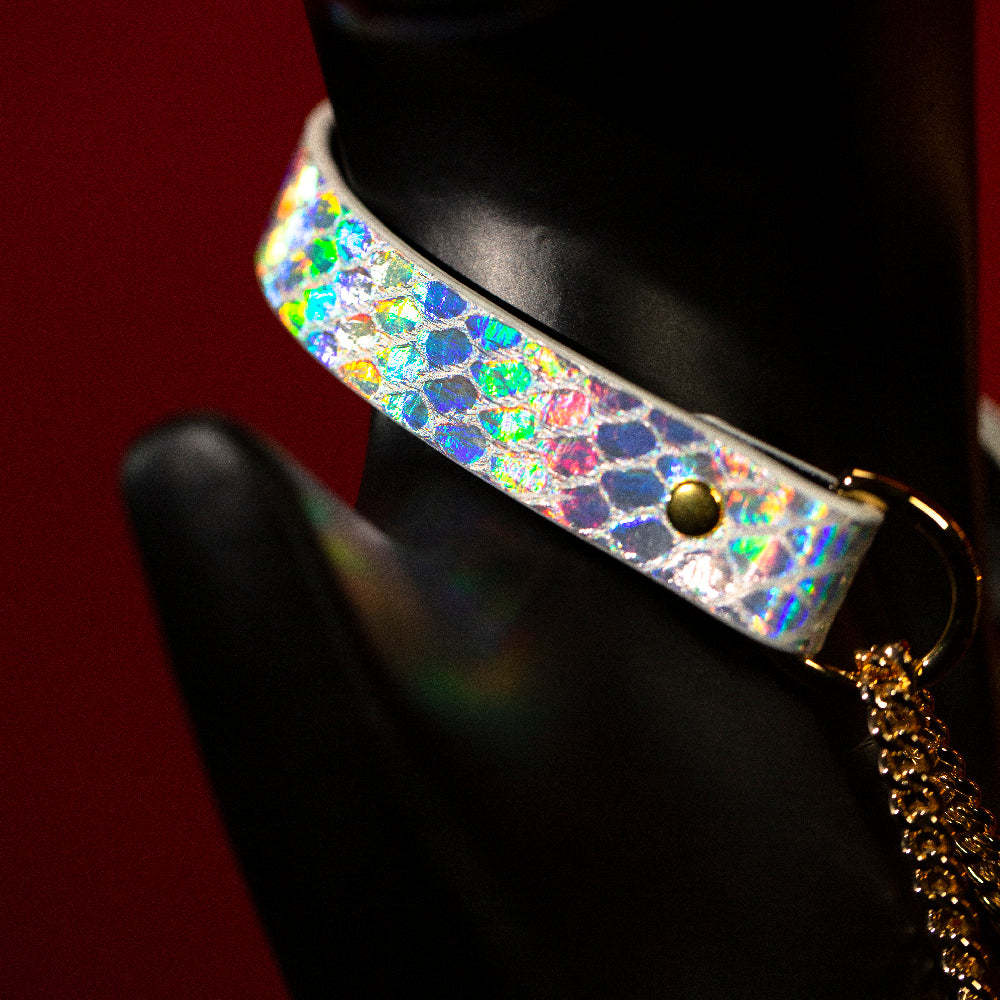 chicchok breathless choker featuring a white textured design with iridescent scales that reflect vibrant rainbow colors