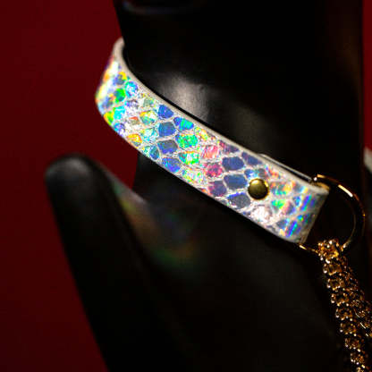 chicchok breathless choker featuring a white textured design with iridescent scales that reflect vibrant rainbow colors