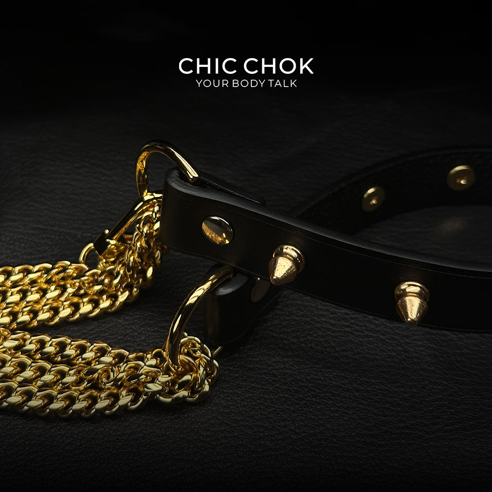 Punk-style choker featuring spikes and leather strap for a statement accessory gold