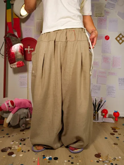 FLAX PLEATED WIDE-LEG PANTS