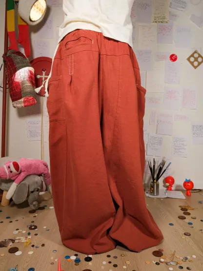 FLAX PLEATED WIDE-LEG PANTS