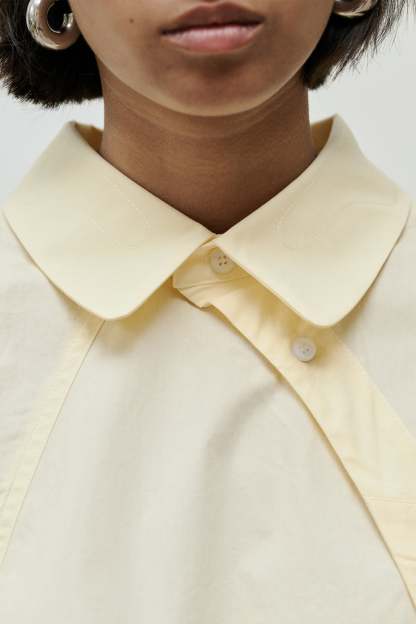 SHIRTS BUTTONED DIAGONALLY