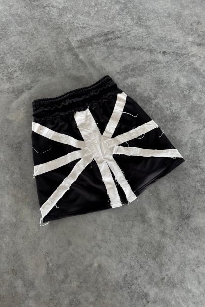 Double-waistband shorts with British-style elements