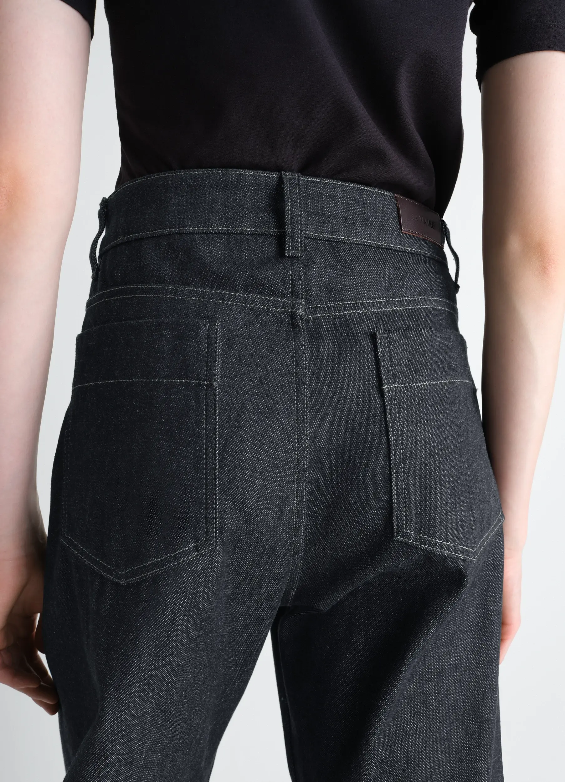 HIGH WAISTED CURVED PANTS IN DENIM